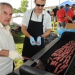 volunteers grilling meats