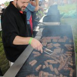 grilling meats at Taste of Serbia